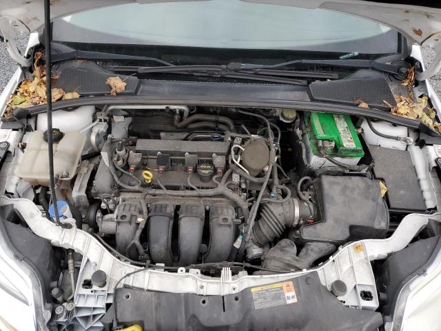 Photo 11 from auction – 2014 FORD FOCUS SE with VIN 1FADP3F24EL115512
