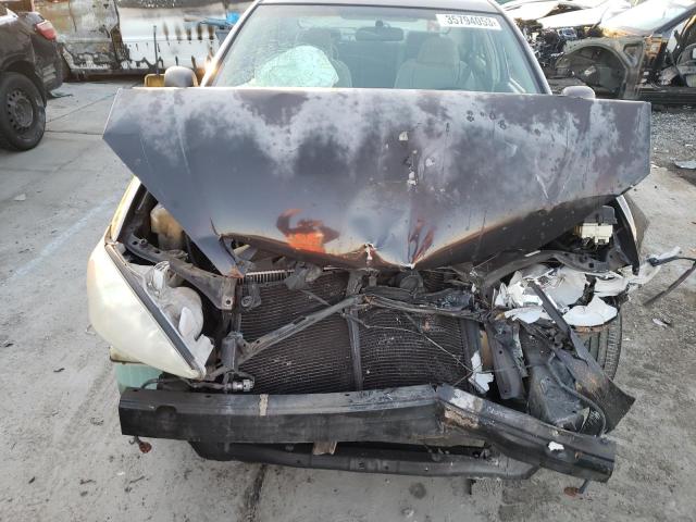 Photo 11 from auction – 2003 TOYOTA CAMRY LE with VIN 4T1BE32K63U722737