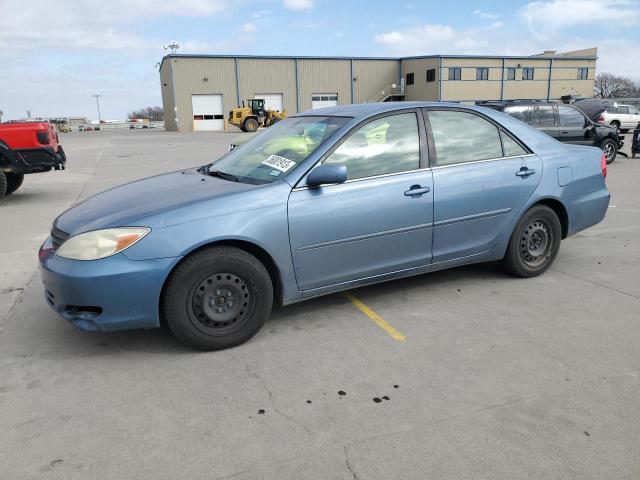 TOYOTA CAMRY LE 2003 with VIN JTDBE32KX30138899 - Photo from auction