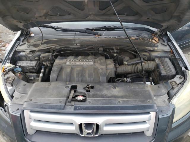 Photo 12 from auction – 2006 HONDA PILOT EX with VIN 2HKYF18586H522605