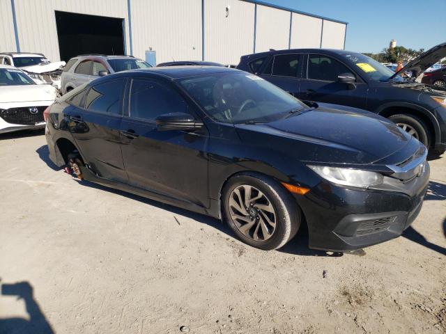 Photo 4 from auction – 2018 HONDA CIVIC EX with VIN 19XFC2F72JE006411