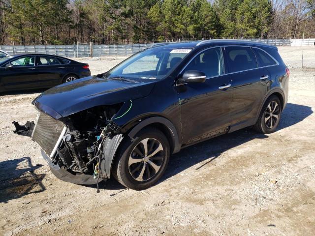 KIA SORENTO EX 2016 with VIN 5XYPH4A57GG049788 - Photo from auction