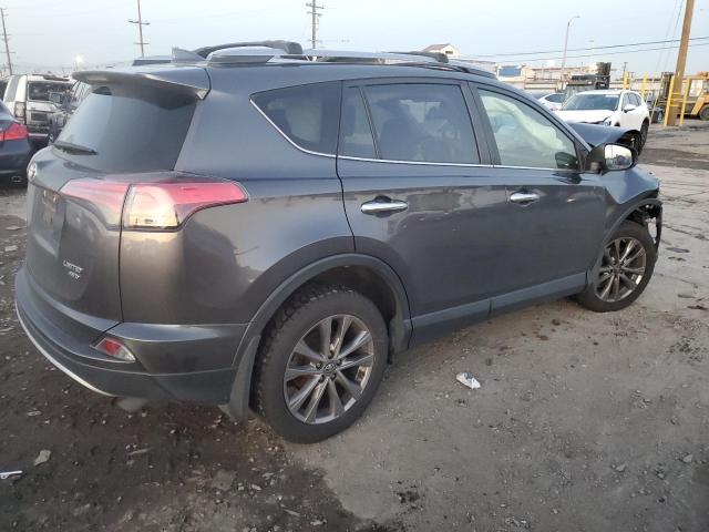 Photo 3 from auction – 2018 TOYOTA RAV4 LIMIT with VIN JTMDFREV5JJ721273