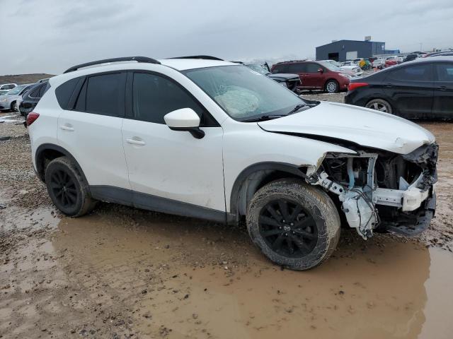 Photo 4 from auction – 2014 MAZDA CX-5 SPORT with VIN JM3KE2BE7E0388535
