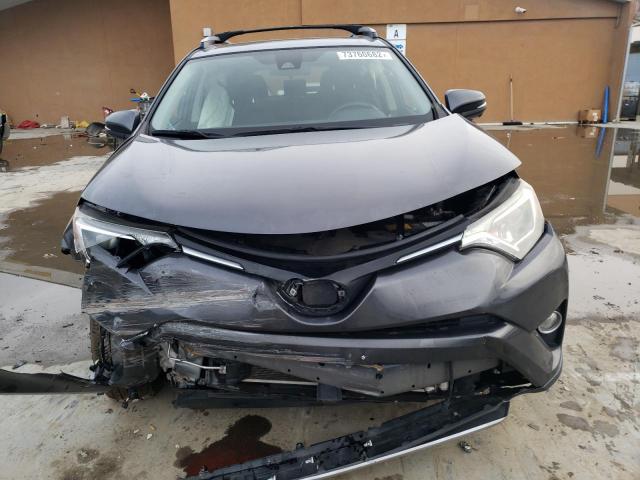 Photo 5 from auction – 2017 TOYOTA RAV4 XLE with VIN JTMWFREV3HJ109236