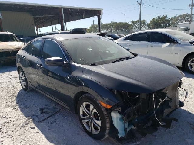 Photo 4 from auction – 2018 HONDA CIVIC LX with VIN 19XFC2F58JE033711
