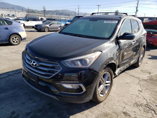 HYUNDAI SANTA FE S 2018 with VIN 5NMZU3LB1JH058100 - Photo from auction