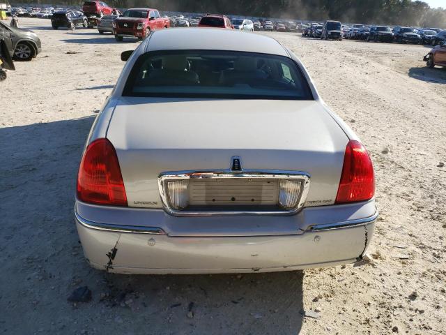 Photo 6 from auction – 2004 LINCOLN TOWN CAR U with VIN 1LNHM83W84Y664748