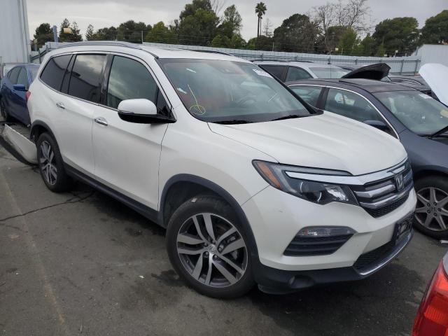 Photo 4 from auction – 2017 HONDA PILOT ELIT with VIN 5FNYF6H07HB035852