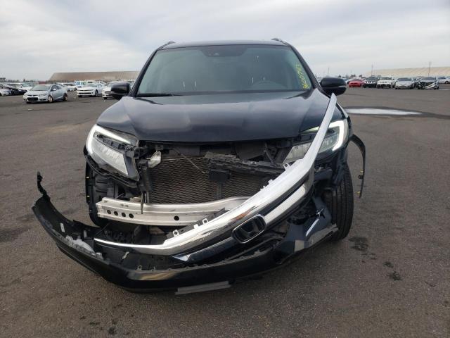 Photo 5 from auction – 2019 HONDA PILOT ELIT with VIN 5FNYF6H0XKB007714