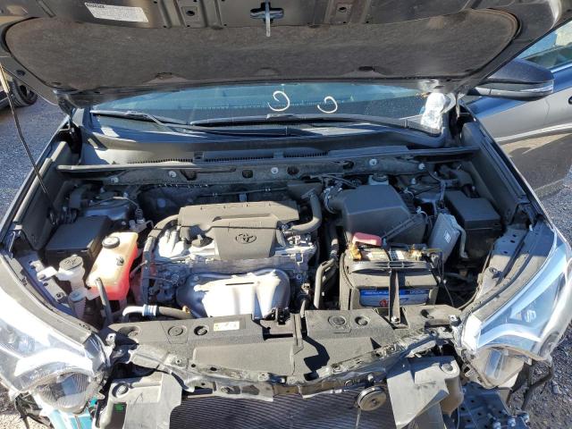 Photo 12 from auction – 2018 TOYOTA RAV4 SE with VIN JTMNFREV8JJ181020