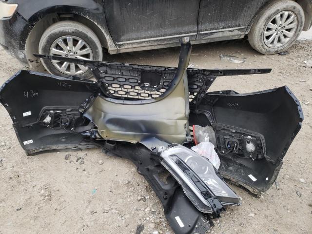 Photo 12 from auction – 2021 HONDA PASSPORT E with VIN 5FNYF8H53MB004521