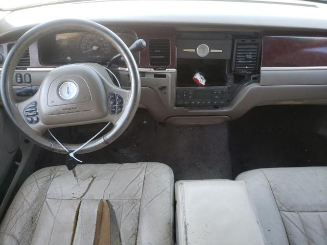 Photo 8 from auction – 2004 LINCOLN TOWN CAR E with VIN 1LNHM81W64Y623666