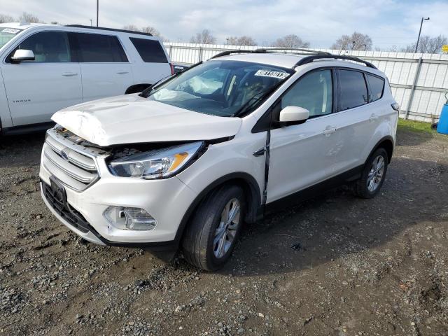 FORD ESCAPE SE 2018 with VIN 1FMCU9GD4JUC24148 - Photo from auction