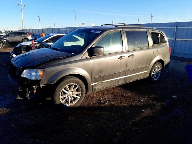 DODGE GRAND CARA 2015 with VIN 2C4RDGCGXFR631186 - Photo from auction