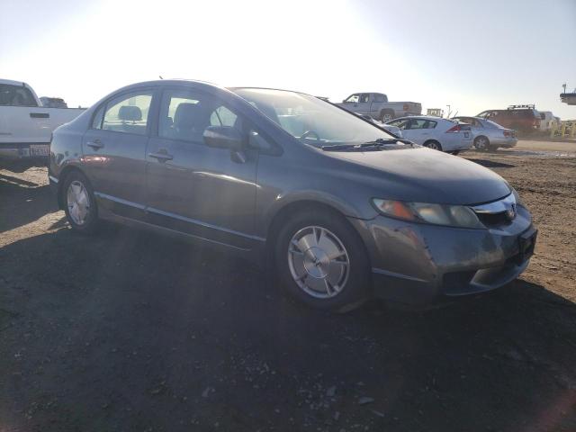Photo 4 from auction – 2010 HONDA CIVIC HYBR with VIN JHMFA3F28AS004786