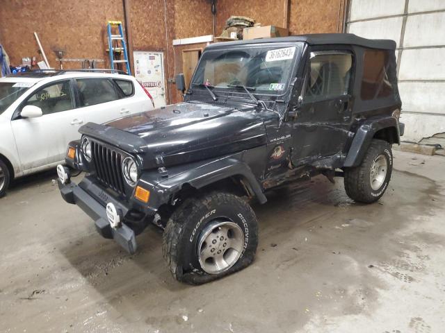 JEEP WRANGLER / 2000 with VIN 1J4FA59S9YP775404 - Photo from auction