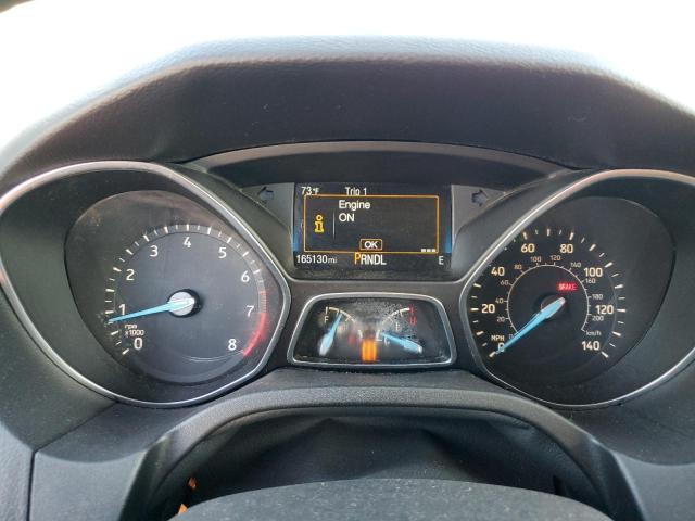 Foto 9 de la subasta – 2015 FORD FOCUS SE con VIN 1FADP3K21FL288864