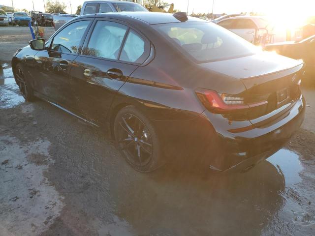 Photo 2 from auction – 2022 BMW 330I with VIN 3MW5R1J04N8C71427