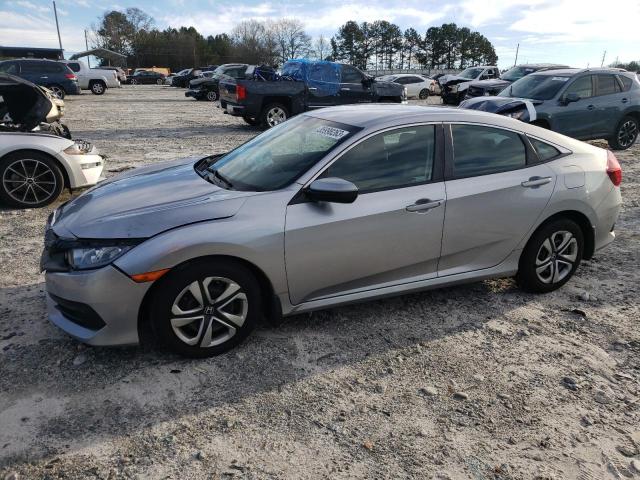 Photo 1 from auction – 2018 HONDA CIVIC LX with VIN 19XFC2F54JE024049