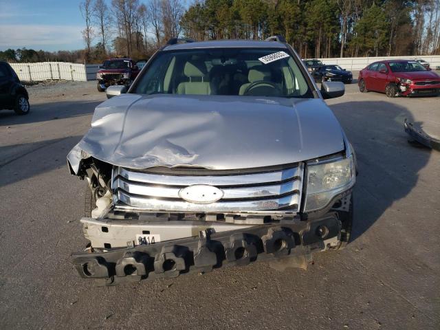 Photo 5 from auction – 2009 FORD TAURUS X S with VIN 1FMDK02W29GA02460