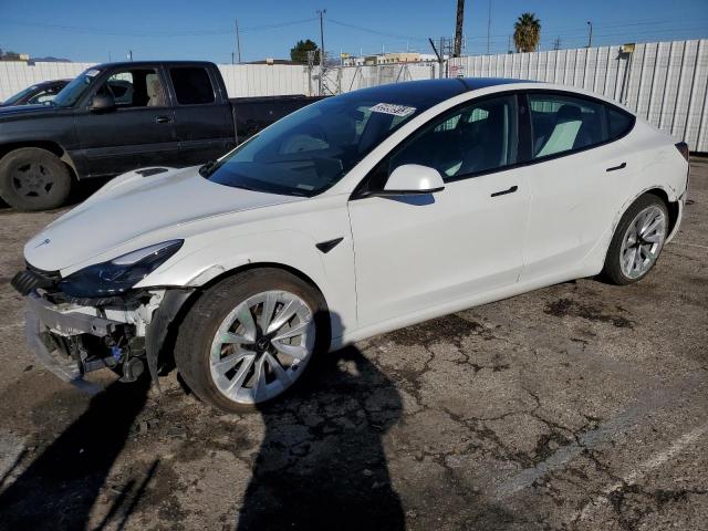 TESLA MODEL 3 2022 with VIN 5YJ3E1EB6NF144823 - Photo from auction
