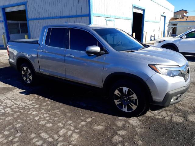 Photo 4 from auction – 2019 HONDA RIDGELINE with VIN 5FPYK3F64KB035792