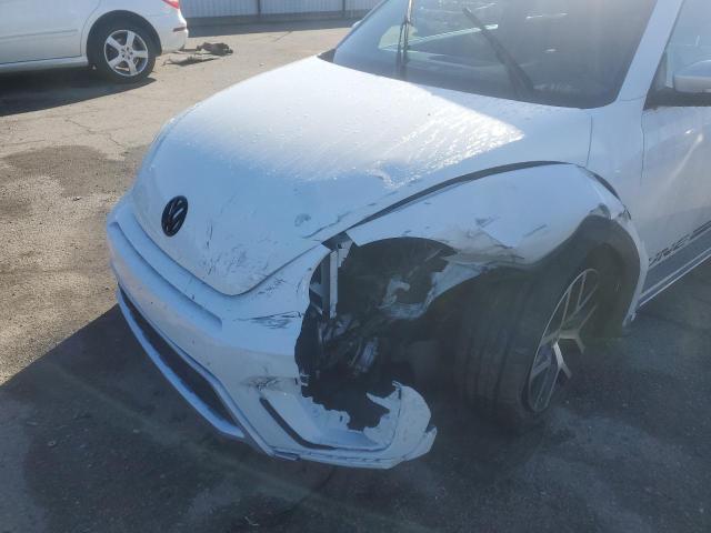 Photo 9 from auction – 2016 VOLKSWAGEN BEETLE DUN with VIN 3VWS17AT5GM621794