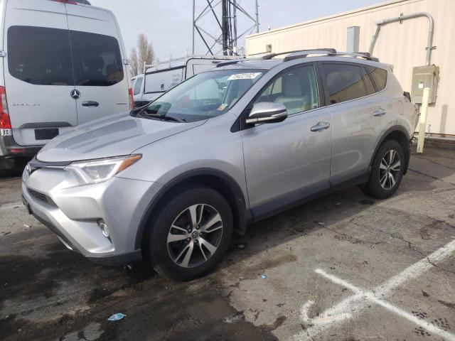 TOYOTA RAV4 XLE 2016 with VIN 2T3WFREV1GW311766 - Photo from auction
