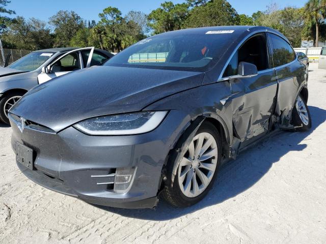 TESLA MODEL X 2017 with VIN 5YJXCAE28HF077704 - Photo from auction