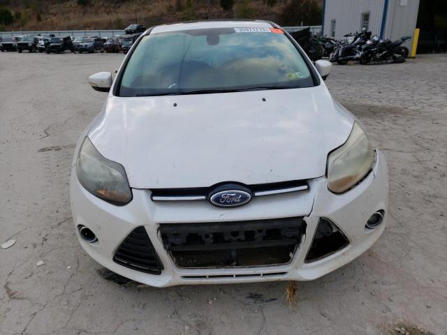 Photo 5 from auction – 2012 FORD FOCUS TITA with VIN 1FAHP3J25CL463003