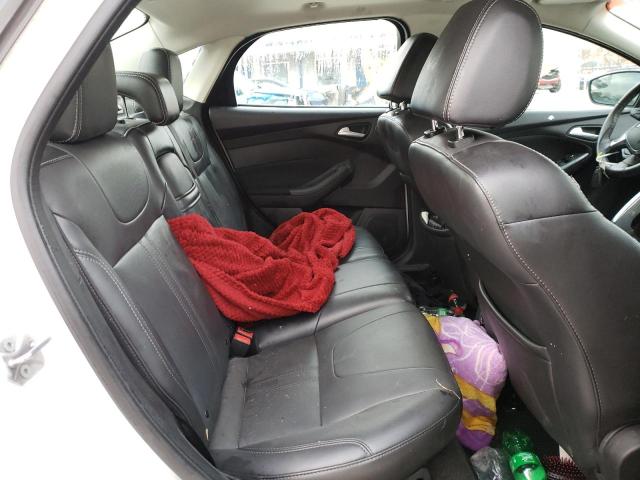 Photo 10 from auction – 2012 FORD FOCUS TITA with VIN 1FAHP3J25CL463003