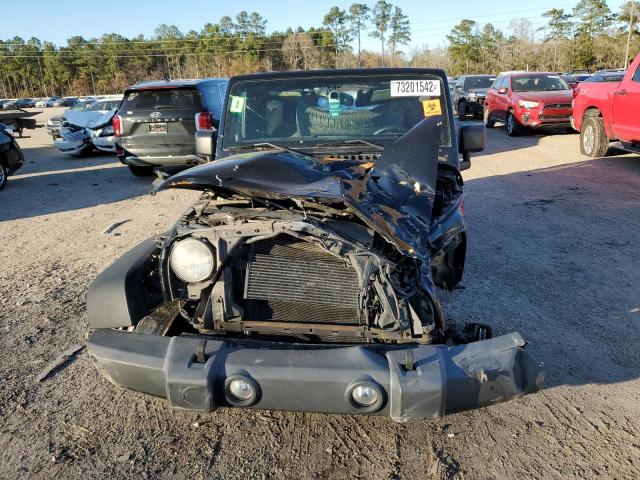 Photo 5 from auction – 2014 JEEP WRANGLER U with VIN 1C4BJWDG3EL139660
