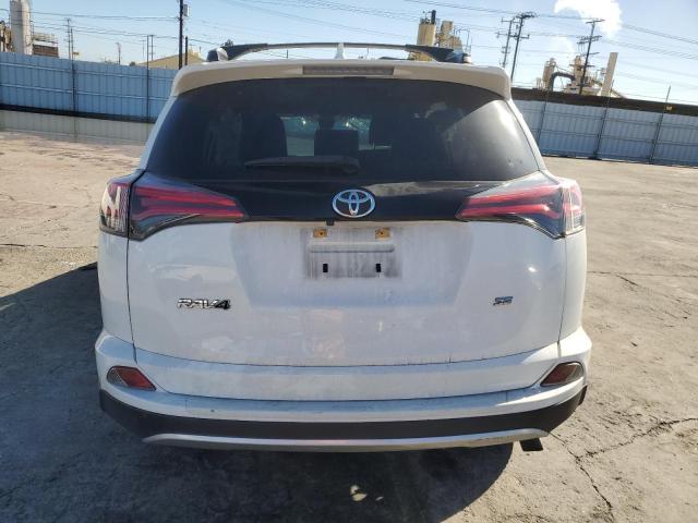 Photo 6 from auction – 2018 TOYOTA RAV4 SE with VIN JTMNFREV1JJ192117