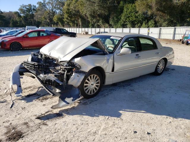 LINCOLN TOWN CAR U 2004 with VIN 1LNHM83W84Y664748 - Photo from auction