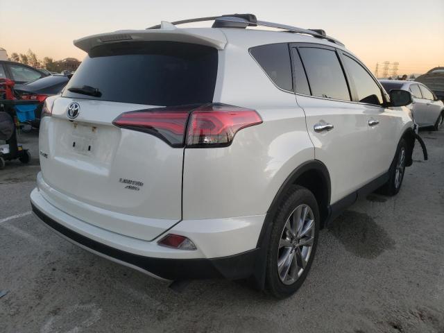 Photo 3 from auction – 2018 TOYOTA RAV4 LIMIT with VIN JTMDFREV3JD248682