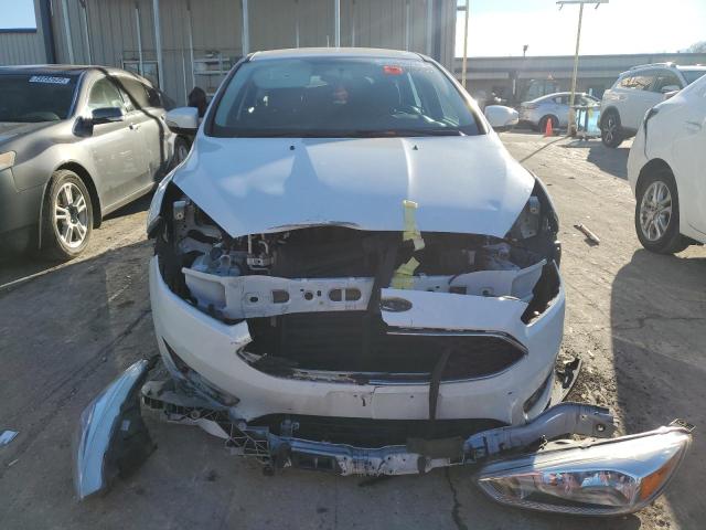 Photo 5 from auction – 2015 FORD FOCUS SE with VIN 1FADP3K22FL386690