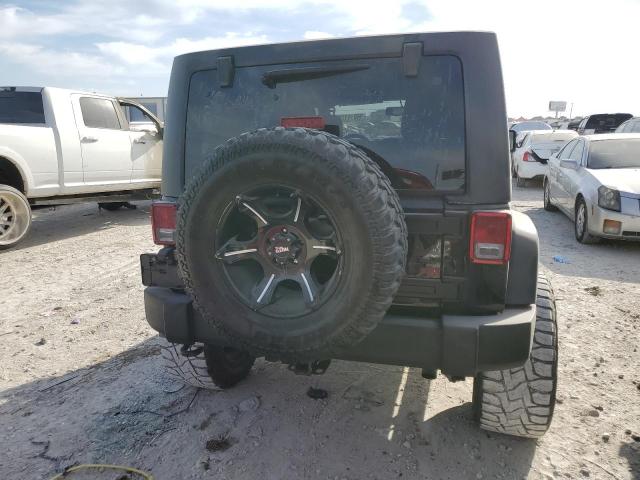 Photo 6 from auction – 2014 JEEP WRANGLER U with VIN 1C4BJWDG0EL130396