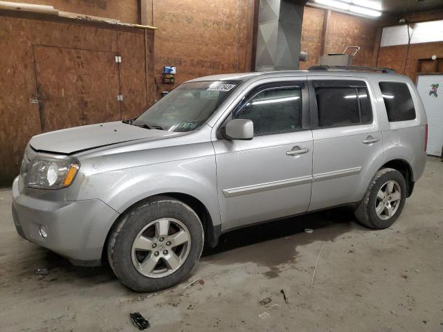HONDA PILOT EXL 2011 with VIN 5FNYF4H56BB076299 - Photo from auction