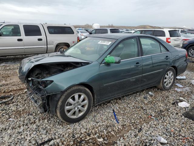 TOYOTA CAMRY LE 2002 with VIN JTDBE32K520045657 - Photo from auction
