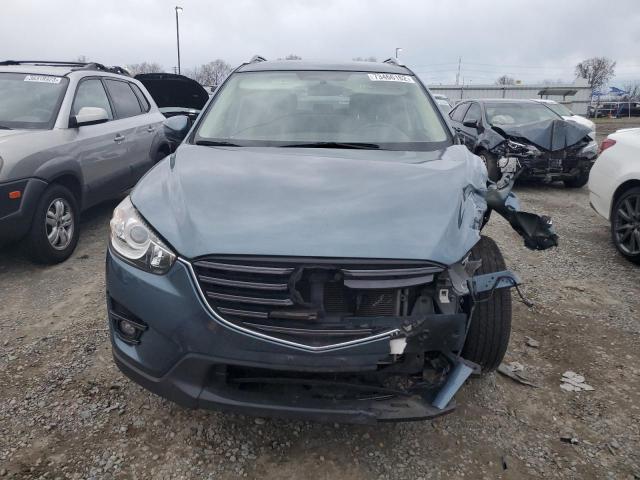 Photo 5 from auction – 2016 MAZDA CX-5 TOURI with VIN JM3KE2CY5G0836086