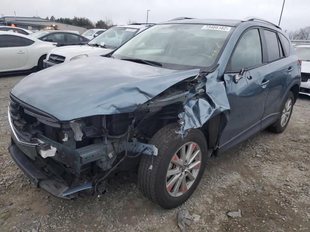 MAZDA CX-5 TOURI 2016 with VIN JM3KE2CY5G0836086 - Photo from auction