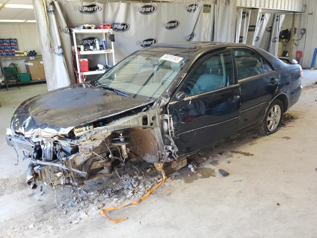 TOYOTA CAMRY LE 2005 with VIN 4T1BF30K75U094190 - Photo from auction