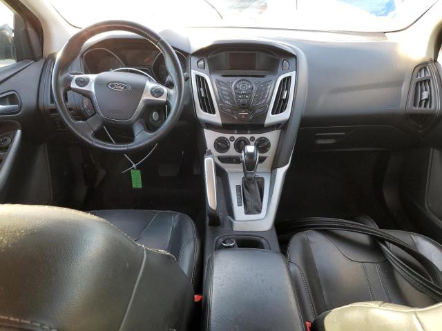 Foto 8 de la subasta – 2014 FORD FOCUS SE con VIN 1FADP3K22EL108581