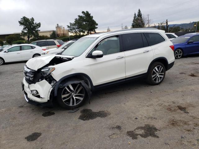 Photo 1 from auction – 2017 HONDA PILOT TOUR with VIN 5FNYF5H96HB036564