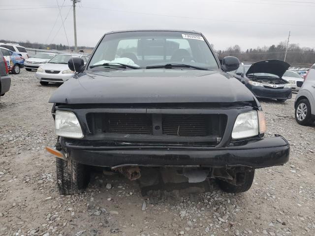 Foto 5 de la subasta – 2003 FORD F150 con VIN 1FTRF07213KD93917
