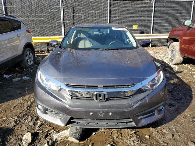 Photo 5 from auction – 2018 HONDA CIVIC EX with VIN JHMFC1F38JX034400