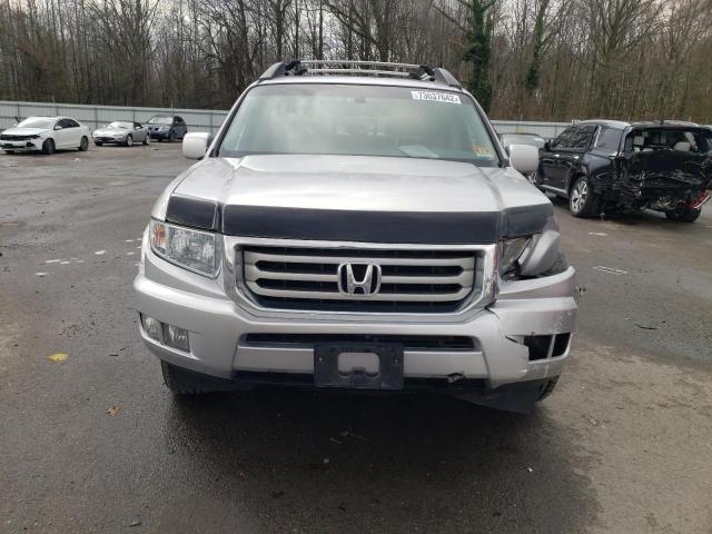 Photo 5 from auction – 2012 HONDA RIDGELINE with VIN 5FPYK1F52CB454561