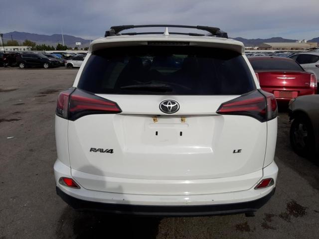 Photo 6 from auction – 2018 TOYOTA RAV4 LE with VIN 2T3ZFREV8JW423131