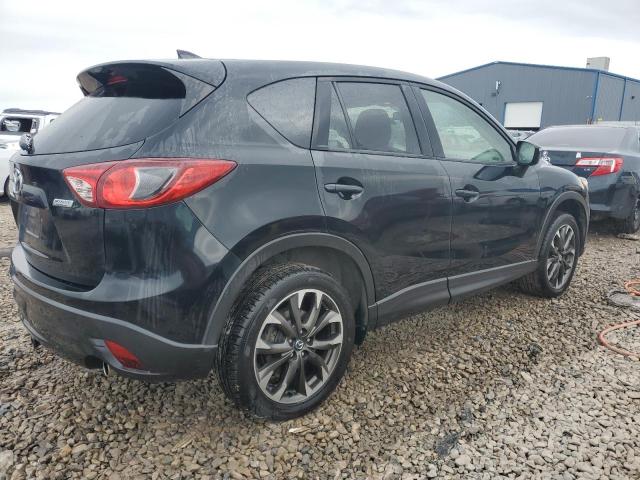 Photo 3 from auction – 2016 MAZDA CX-5 GT with VIN JM3KE4DYXG0656693
